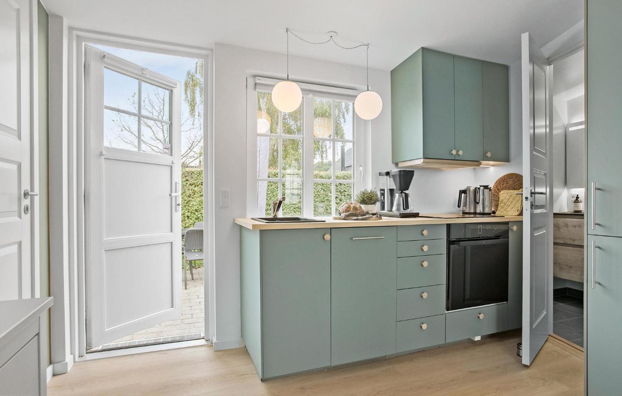 Beach Front Home In Sjolund With Kitchen Exterior photo